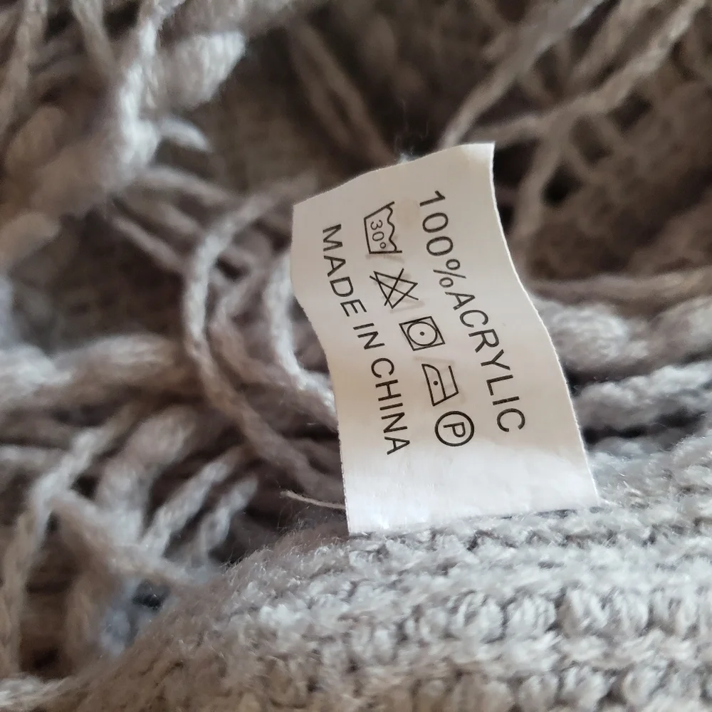 Grey knit tassel throw blanket